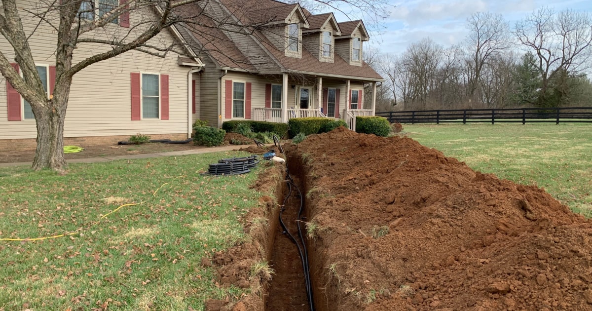Aanleg leidingen aardwarmtepomp huis