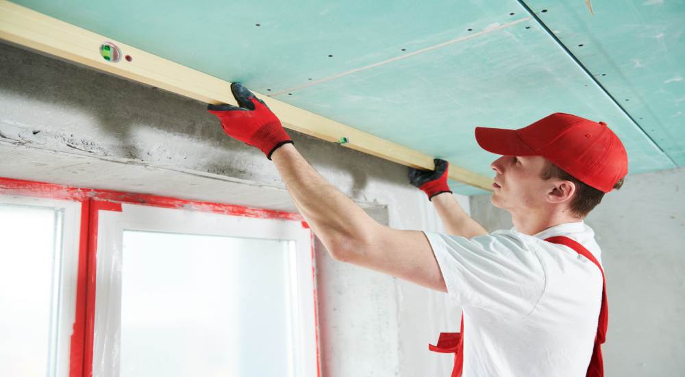 Het afwerken van een gyproc badkamer.