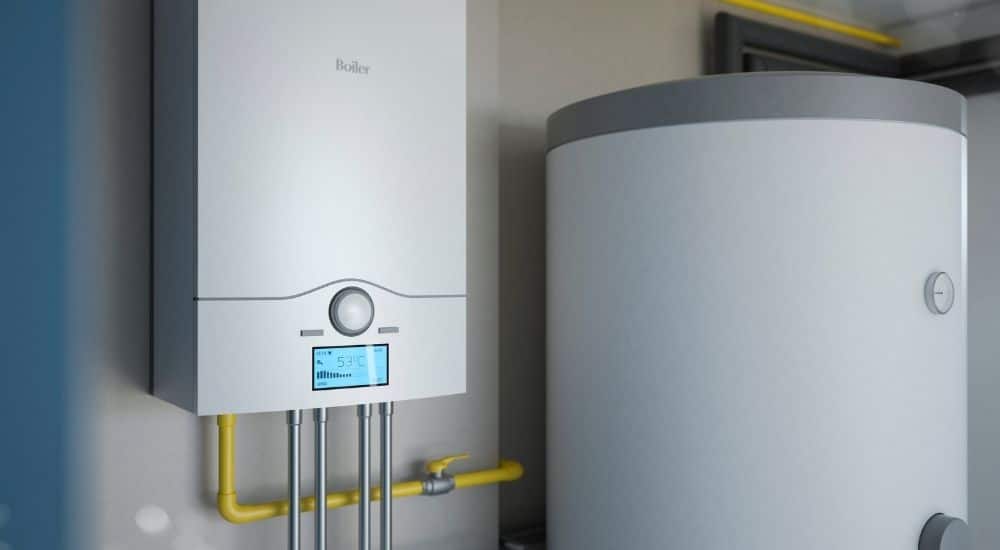 Een witte hybride mazout waterpomp tegen een witte muur.