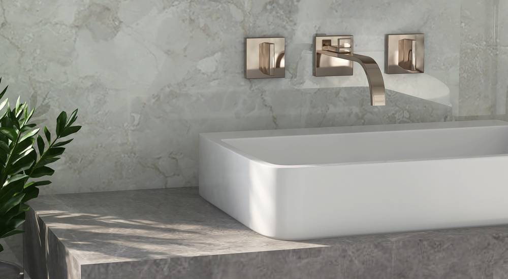 Tweegreepsmengkraan in een gouden kleur.