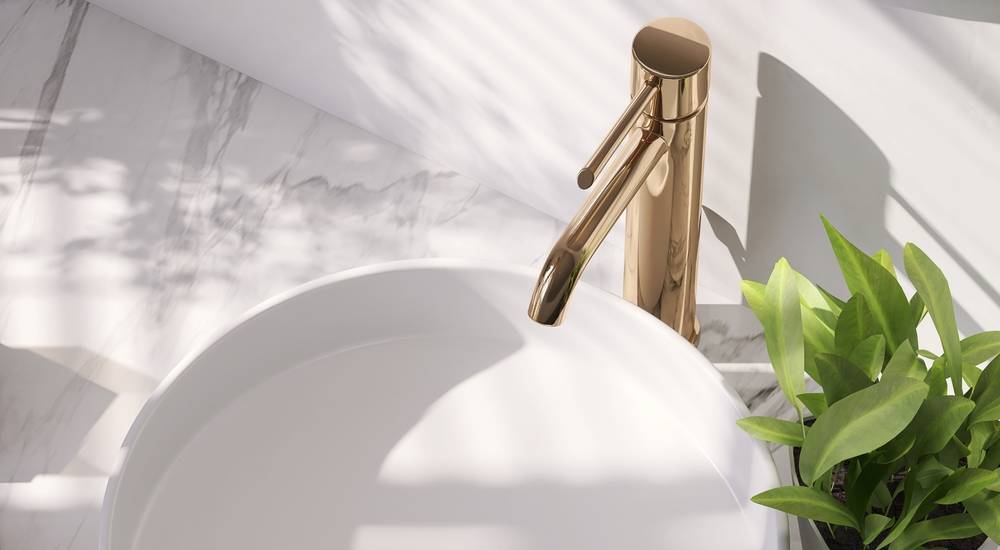 Eengreepsmengkraan in een gouden kleur.