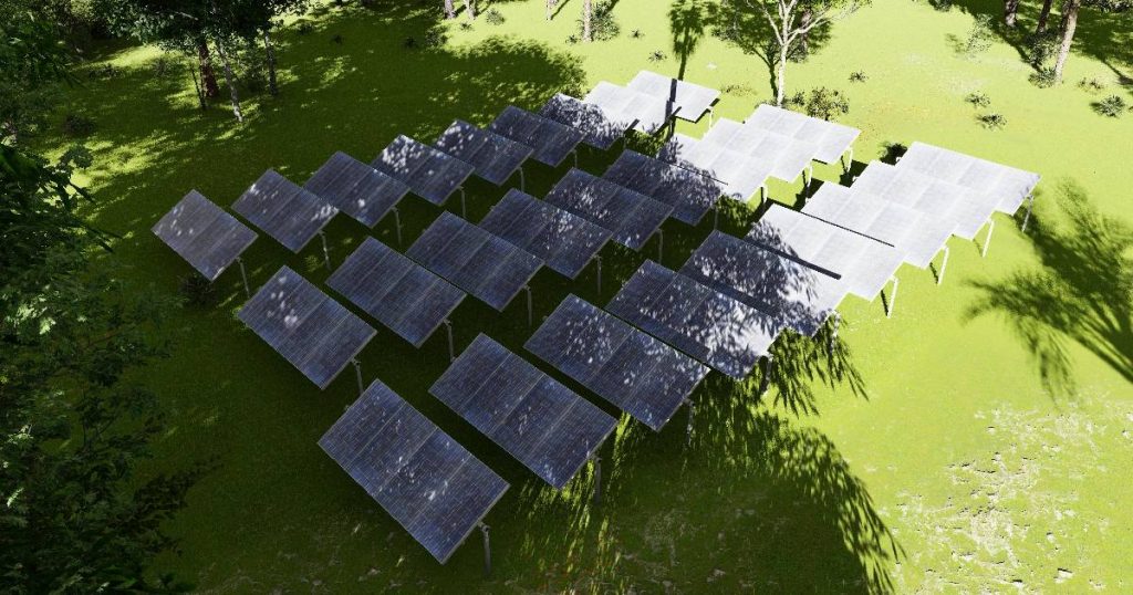 Zonnepanelen en schaduw op een grasvlakte.