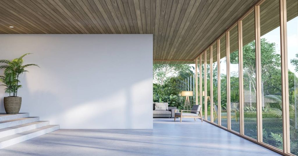Een betonnen trap en vloer gecombineerd met een houten plafond, waardoor je een natuurlijke en frisse uitstraling krijgt. 