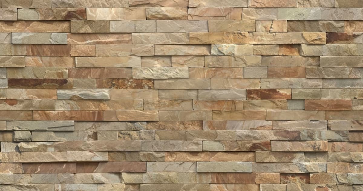 Steenstrips gemaakt van natuursteen met een beige kleur. De stenen zijn onregelmatig geplaatst waardoor een unieke uitstraling ontstaat.