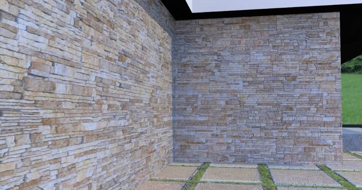 Een stenen gevel van een woning. De stenen zijn onregelmatig van vorm en kleur.