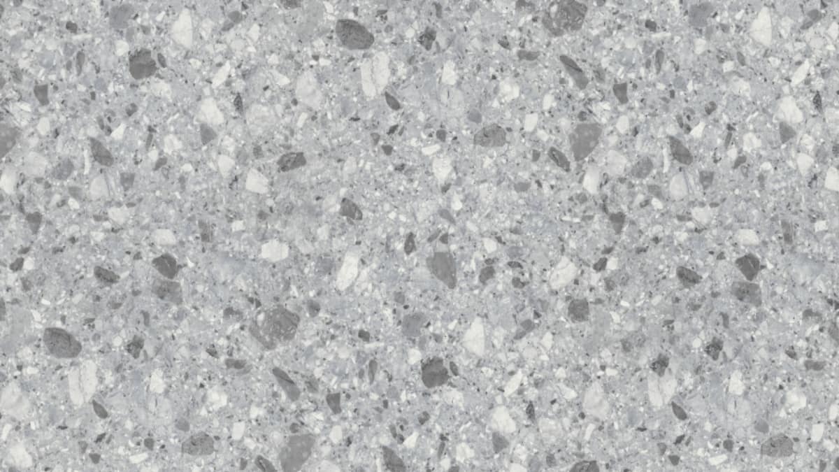 Een grijze steenstrip met kleuraccenten. 