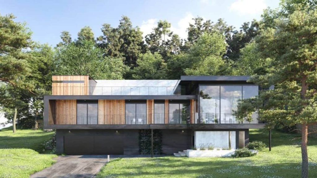 Een moderne woning waarbij de zwarte sierpleister gecombineerd wordt met hout. Rondom het huis zijn veel bomen zichtbaar.